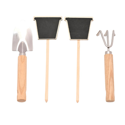 Set of gardening tools with wooden handles on a white background