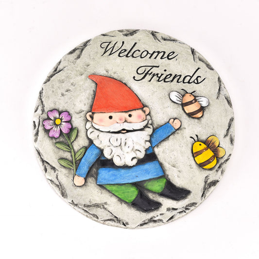 Decorative stone with a gnome, flowers, and bees on a white background