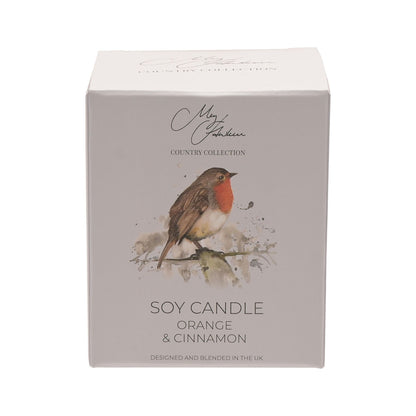 Soy candle packaging with a robin design on a white background