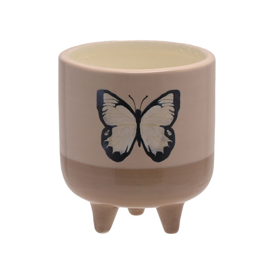 Ceramic pot with a butterfly design on a white background