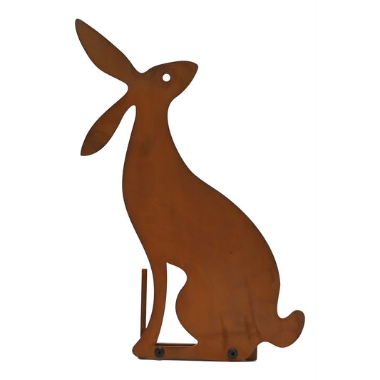 Rust-colored metal rabbit sculpture on a white background