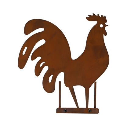 Rust-colored metal rooster decorative piece on a white background