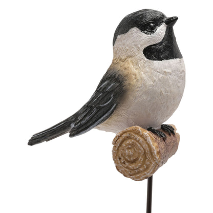 Decorative bird figurine on a white background