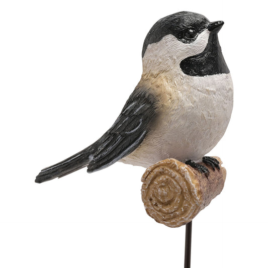Decorative bird figurine on a white background
