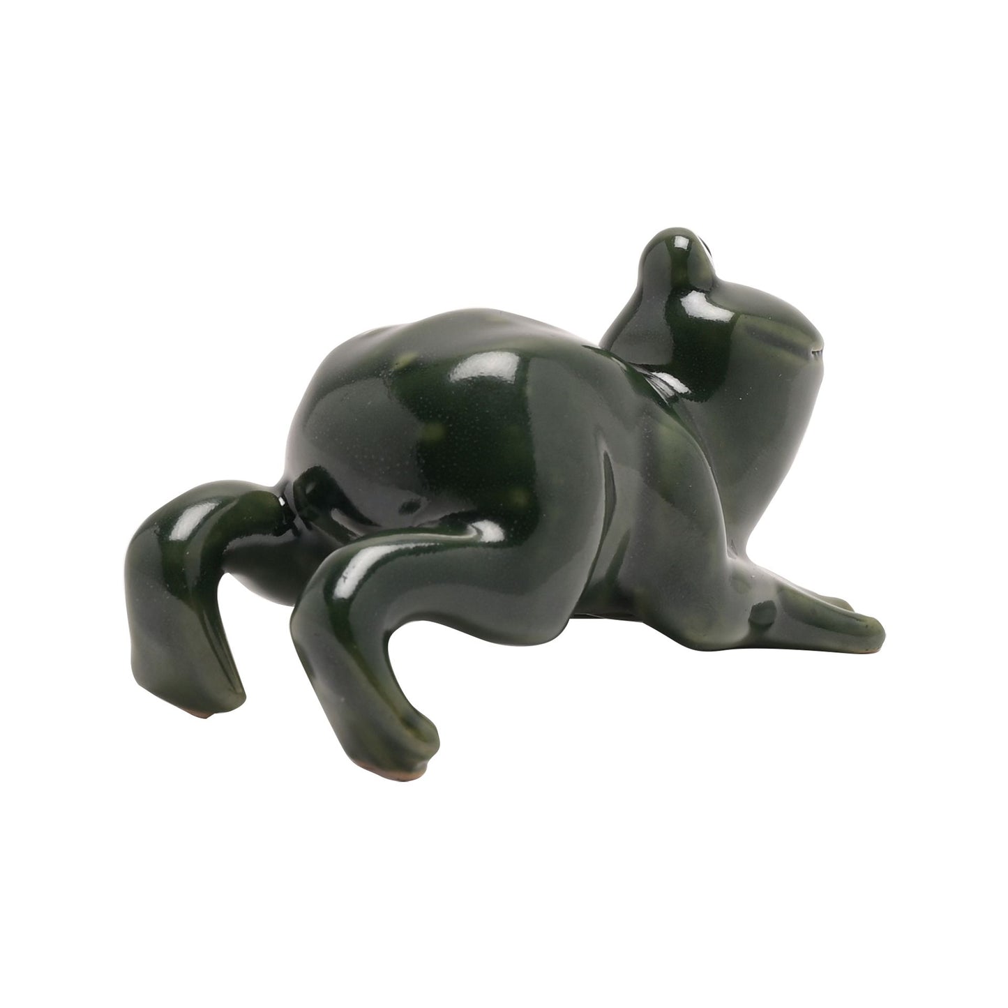 Green ceramic frog figurine on a white background