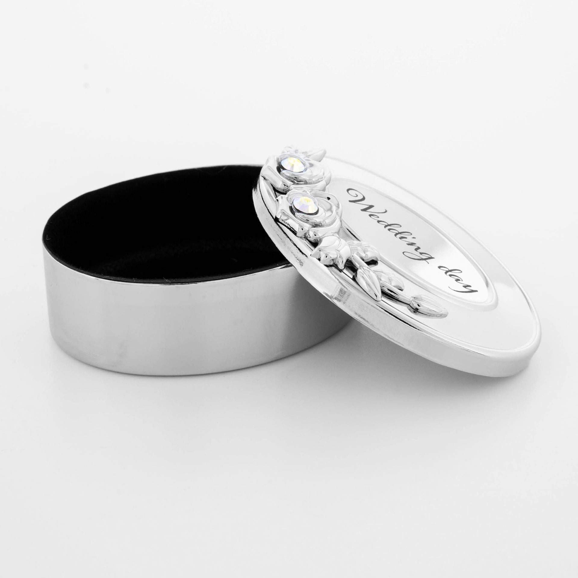 Silver trinket box with 'Wedding day' engraving on a white background