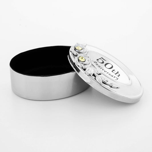 Silver tin with '50th anniversary' text on a white background