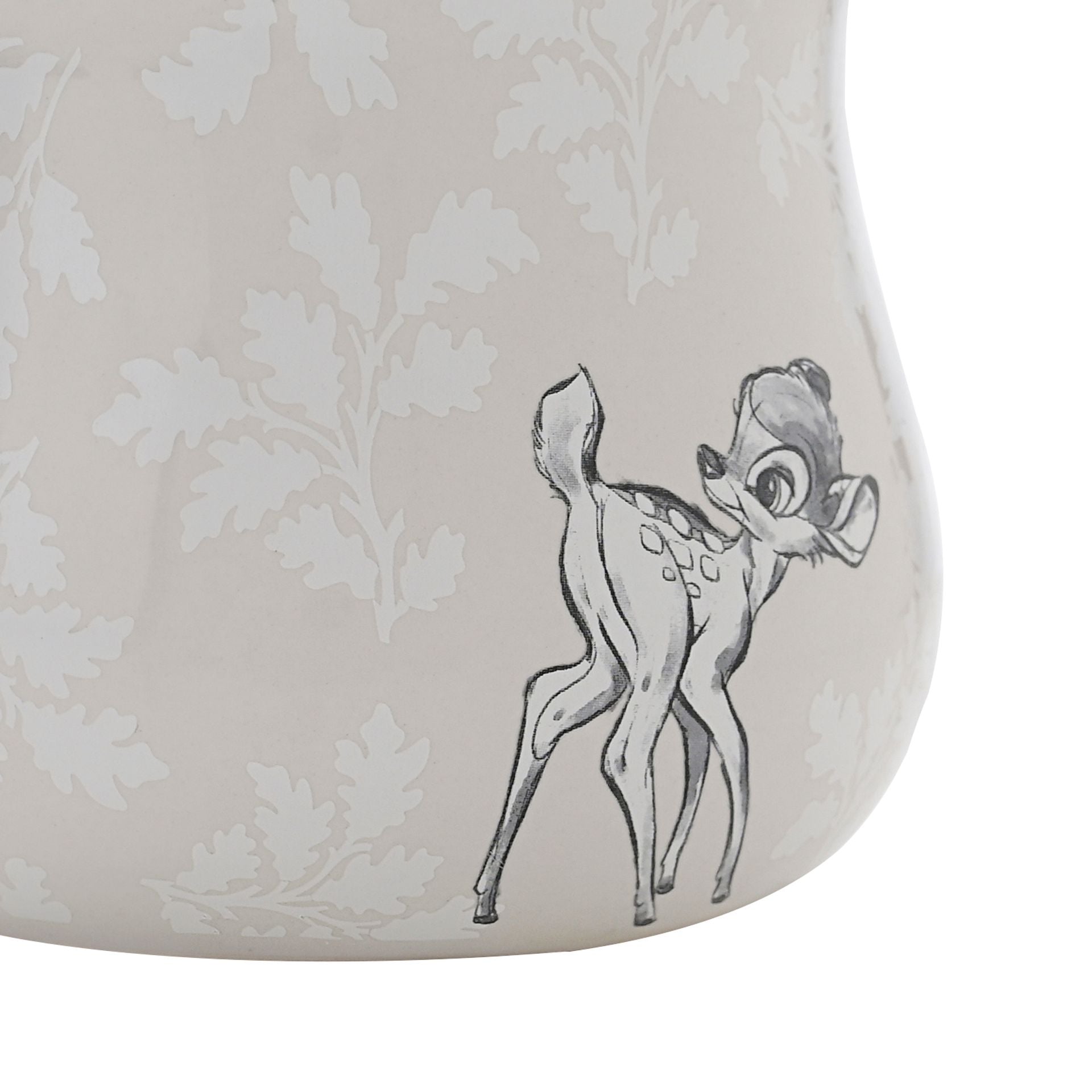 Ceramic mug with a black and white illustration of a deer on a beige background