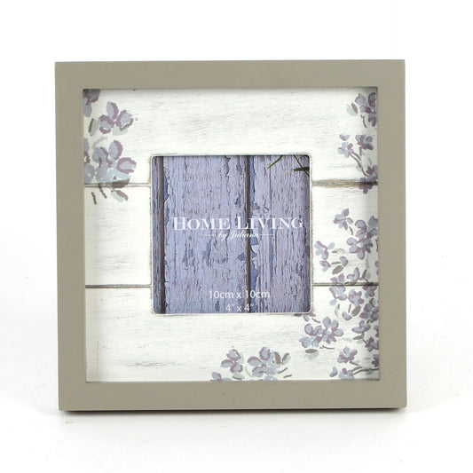 Decorative picture frame with floral design on a white background