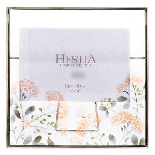 Decorative photo frame with floral design and 'Hestia Home Collection' branding.