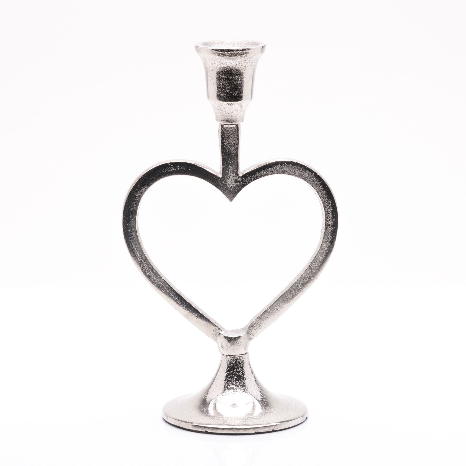 Silver heart-shaped candle holder on a white background