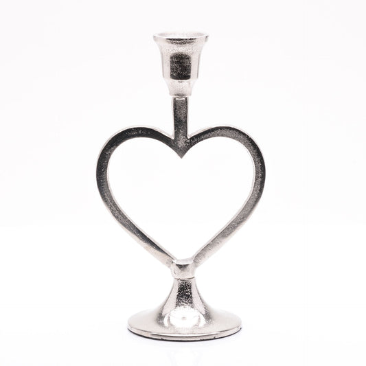 Silver heart-shaped candle holder on a white background