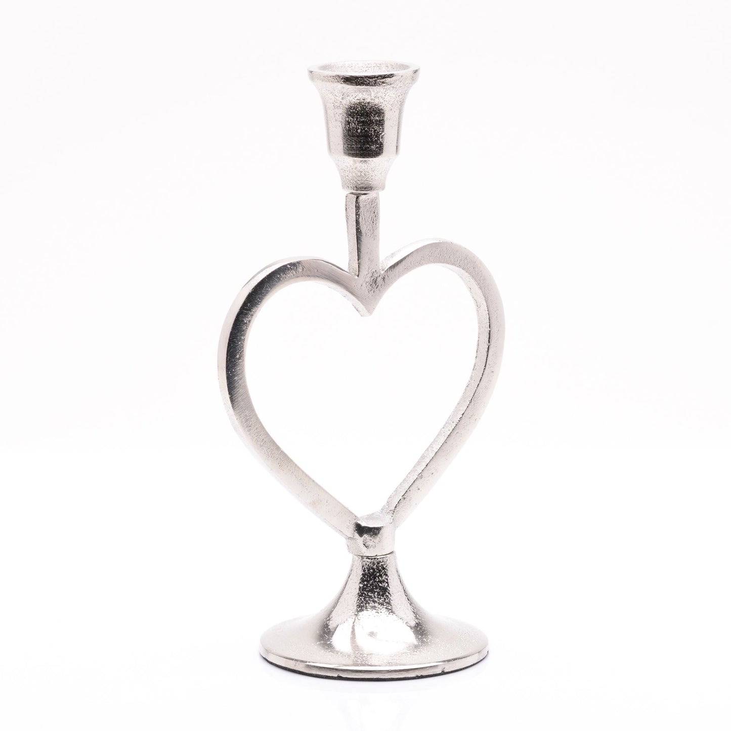 Silver heart-shaped candle holder on a white background