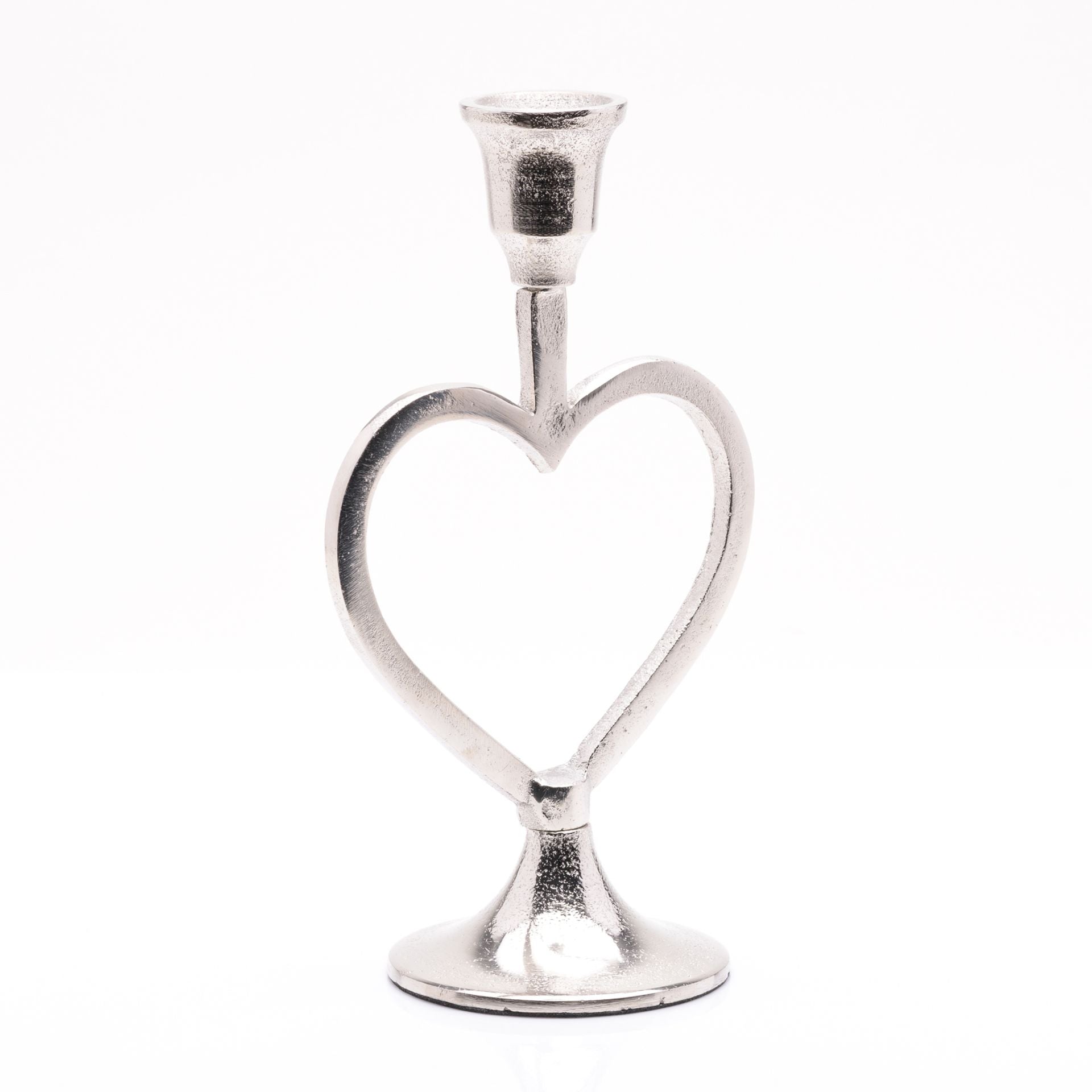 Silver heart-shaped candle holder on a white background