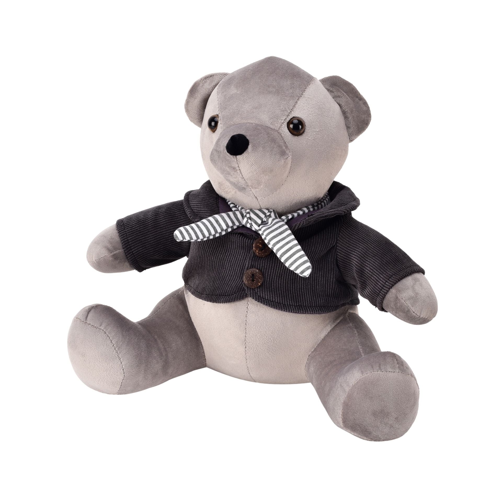 Gray teddy bear wearing a dark jacket with buttons and a striped scarf on a white background