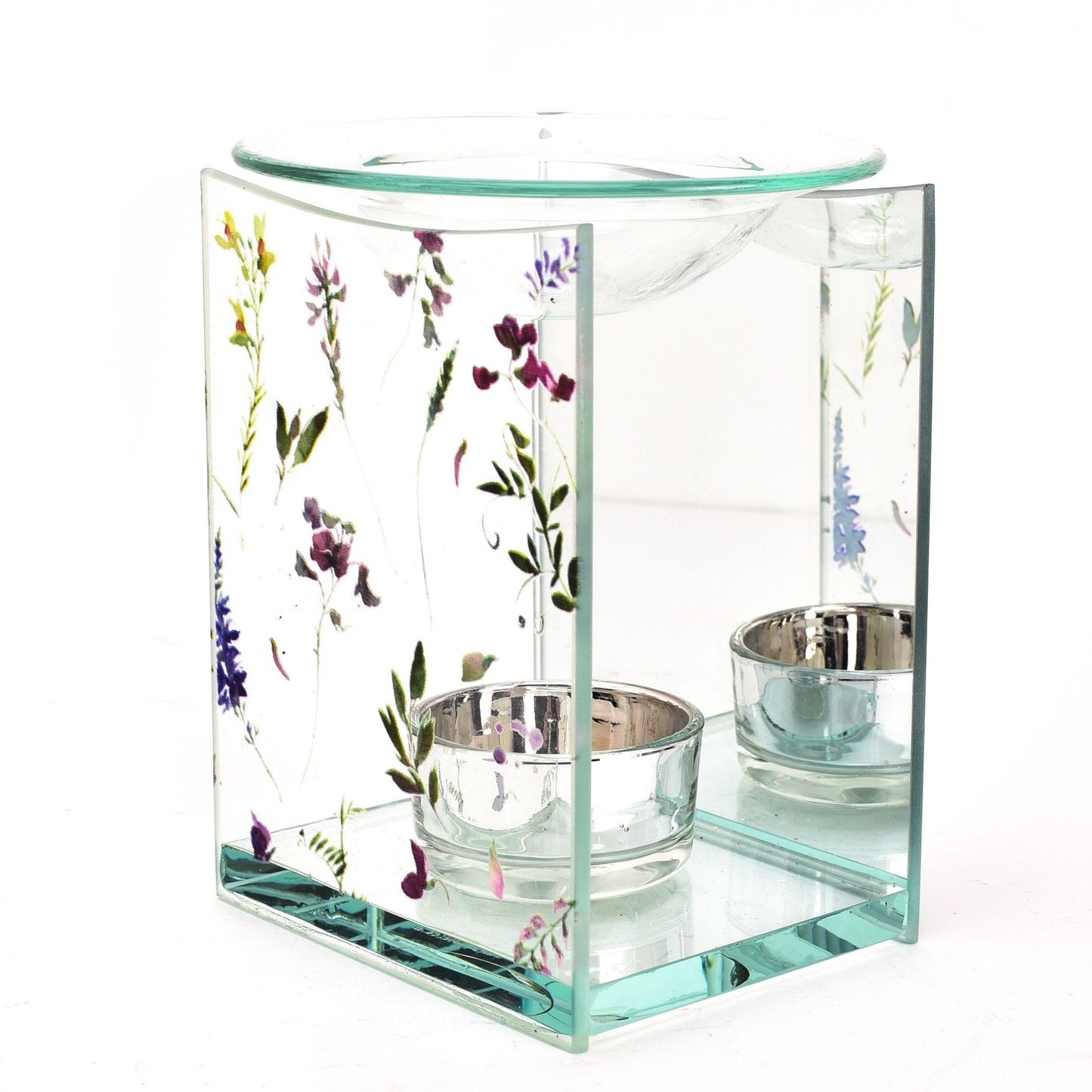 Glass candle holder with floral design on a white background