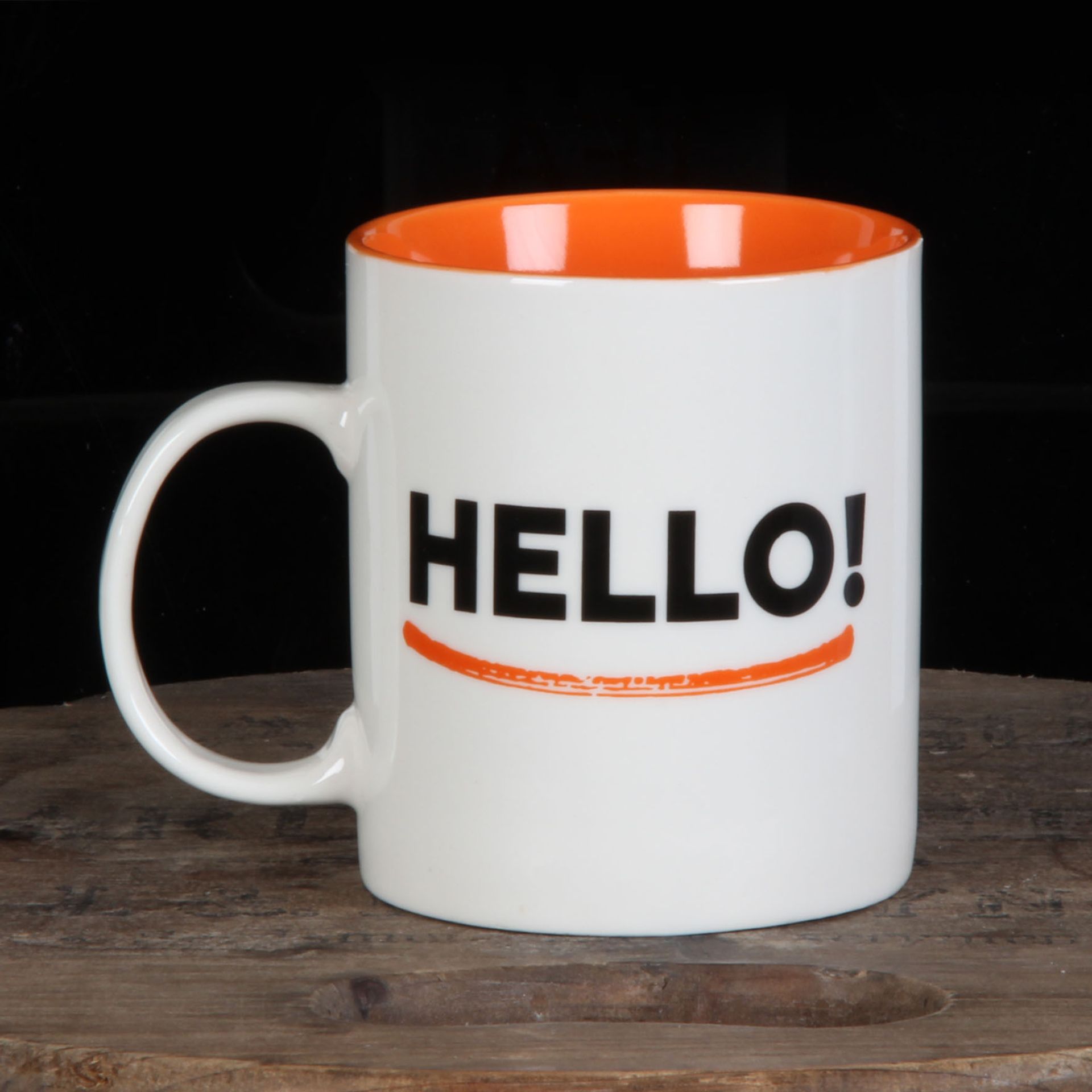 White and orange mug
