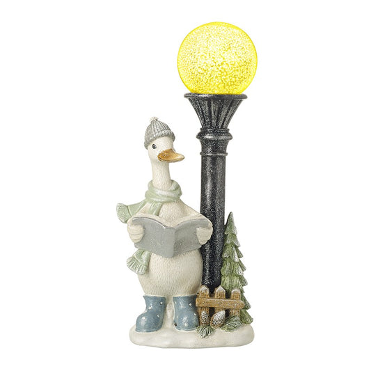 Decorative figurine of a duck with a lamp post and light bulb on a white background
