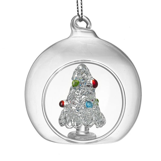Clear glass ornament with a decorative Christmas tree inside on a white background