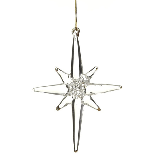 Decorative star-shaped ornament with a central gem on a white background