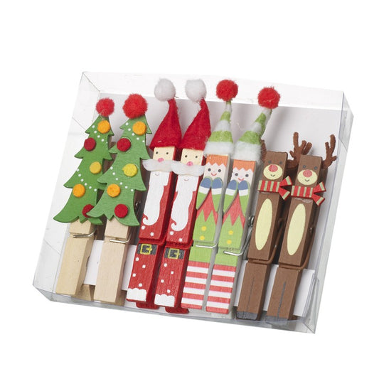 Set of Christmas-themed clothespins in a clear packaging box.