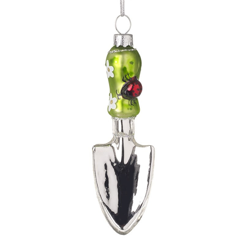 Decorative ornament shaped like a garden trowel with a green handle featuring a ladybug and flowers, on a white background.