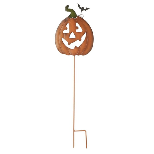 Decorative pumpkin stake with a face on a white background