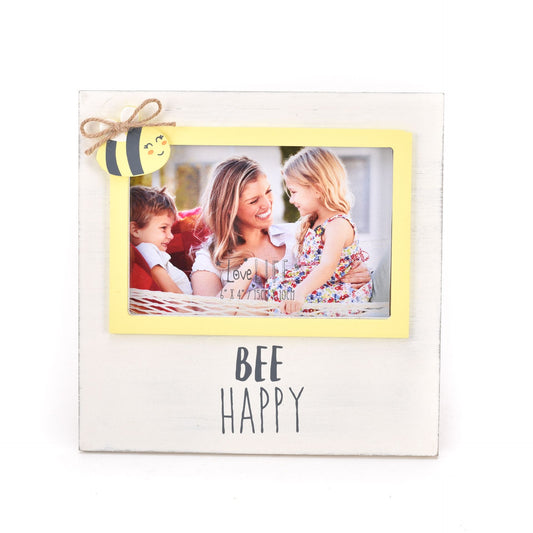 Photo frame with a picture of a family and 'BEE HAPPY' text on a white background