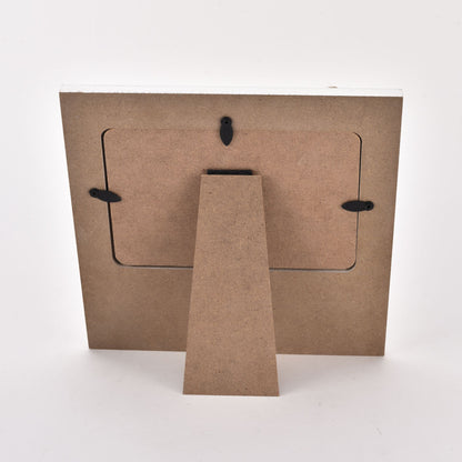 Two cardboard boxes with cut-out handles on a white background