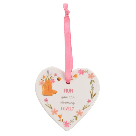 Heart-shaped hanging ornament with floral design and 'Mum you are blooming lovely' text on a white background.