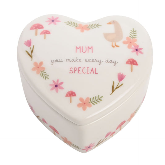 Heart-shaped box with floral designs and text on a white background