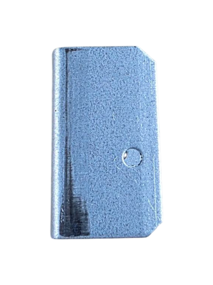 A rectangular metallic blue-gray component with a textured surface, a rounded top-right corner, and a small circular hole near the center, isolated on a white background.