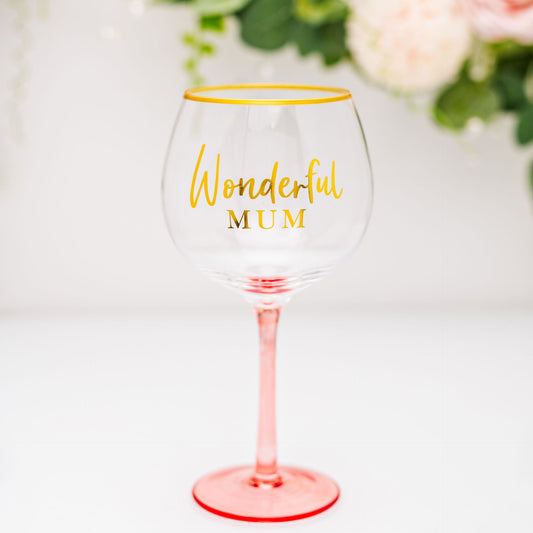 Wine glass with 'Wonderful Mum' text on a white background