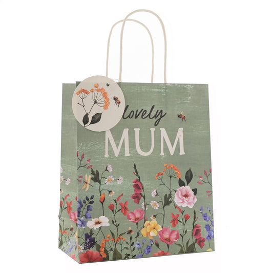 Gift bag with floral design and 'lovely MUM' text on a white background