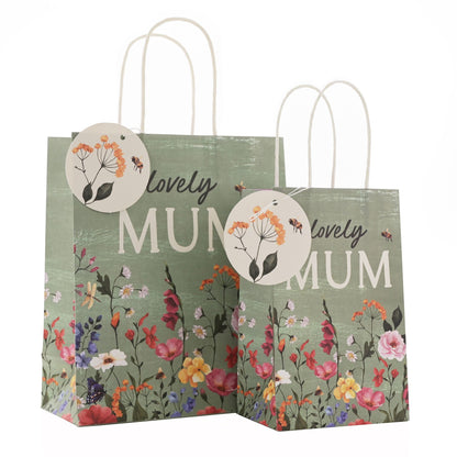 Floral-themed gift bag with 'lovely MUM' text on a white background