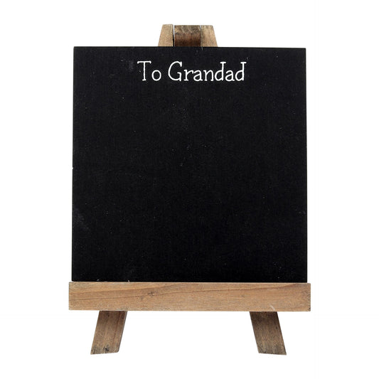 Small blackboard with 'To Grandad' text on a wooden stand against a white background