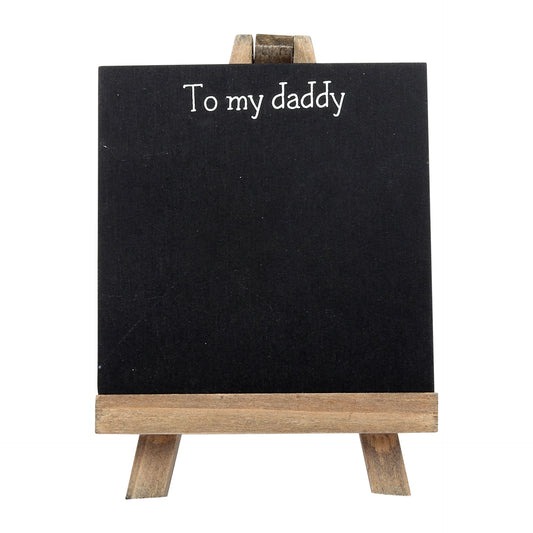 Small blackboard with 'To my daddy' text on a wooden stand against a white background