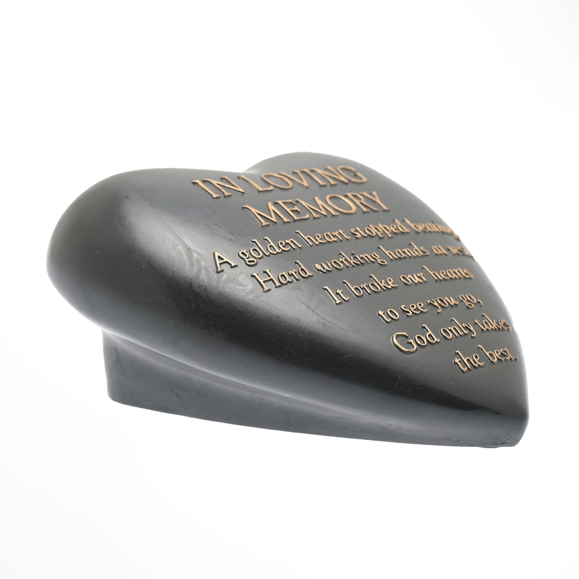 Heart-shaped memorial plaque with engraved text on a white background
