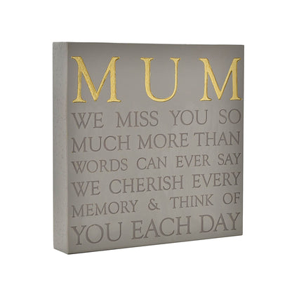 Decorative plaque with 'MUM' in gold and heartfelt message on a gray background