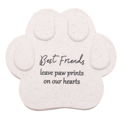 Paw-shaped decorative item with 'Best Friends leave paw prints on our hearts' text on a white background