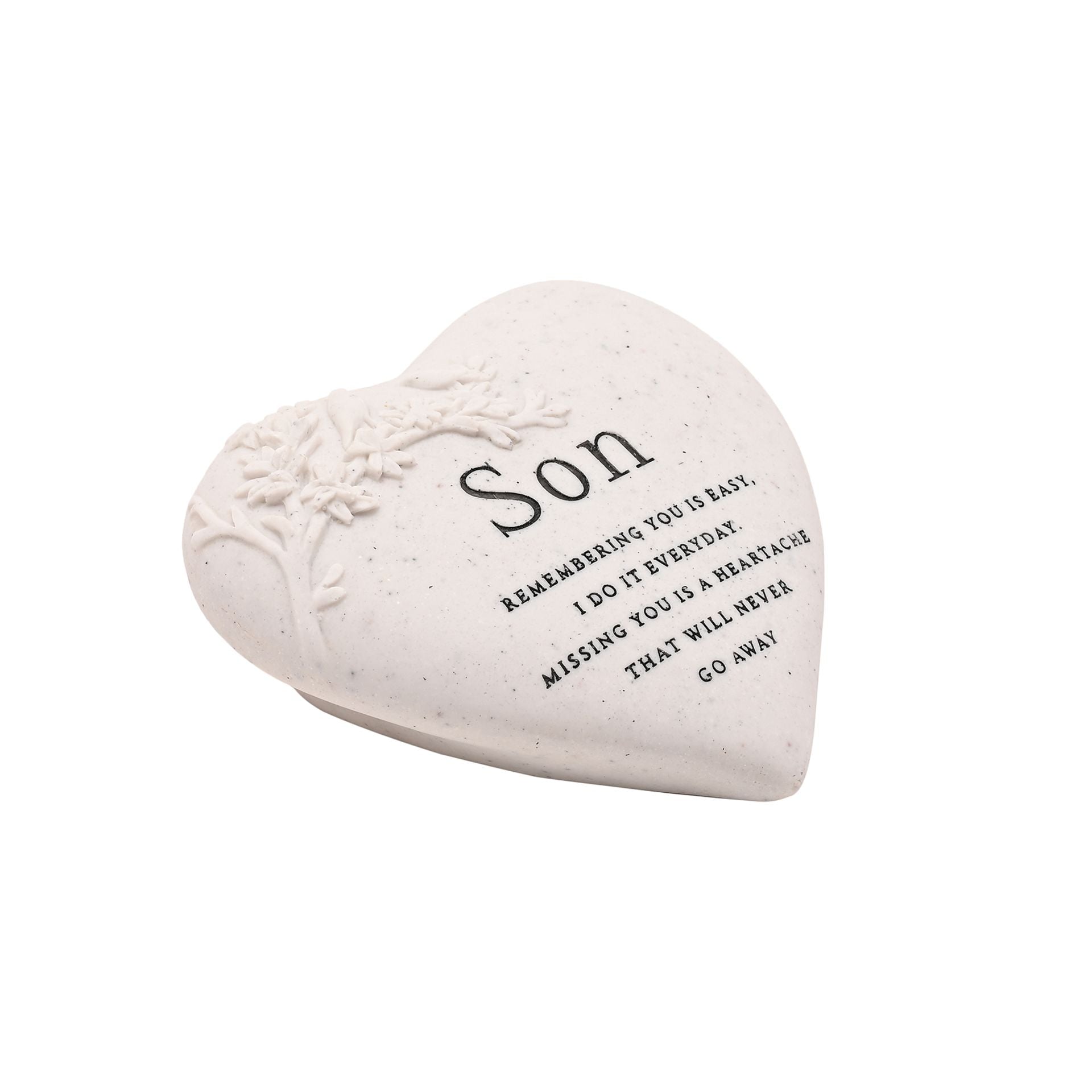 Heart-shaped stone with engraved text on a white background