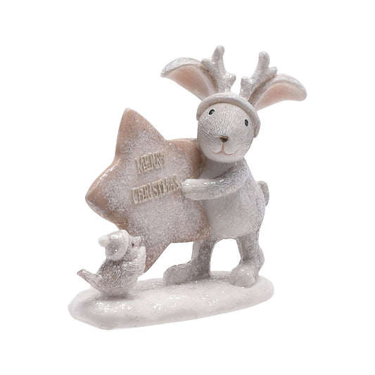 Decorative figurine of a rabbit with reindeer antlers holding a 'Merry Christmas' sign on a white background.