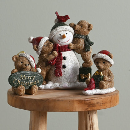 Christmas-themed figurine with snowman and bears on a wooden stool against a gray background