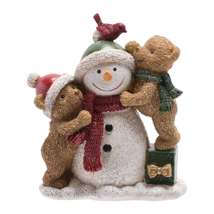 Decorative figurine of a snowman with two bears and a bird on a white background