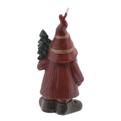Candle shaped like a person in a red coat holding a tree on a white background