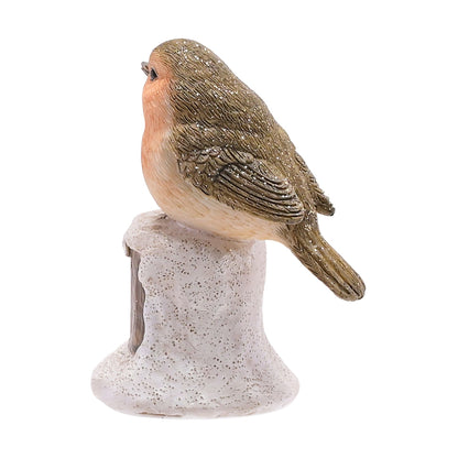Bird figurine on a white background