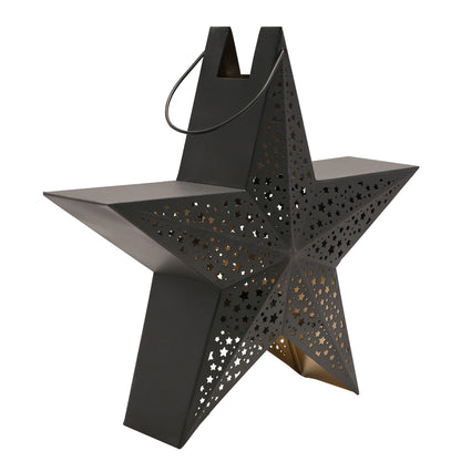 Black star-shaped lantern with cut-out patterns on a white background