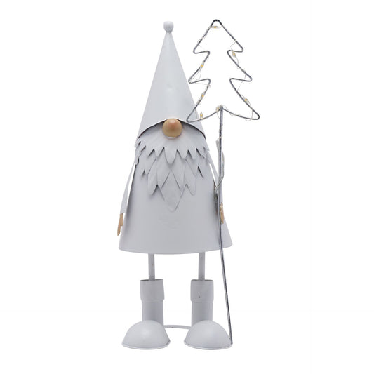 Decorative gnome figure with a white hat and boots, standing next to a wire tree on a white background.