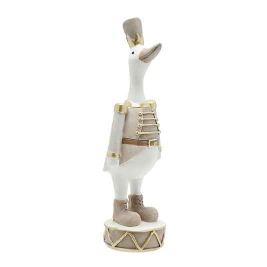 Decorative figurine of a duck in a nutcracker costume on a white background