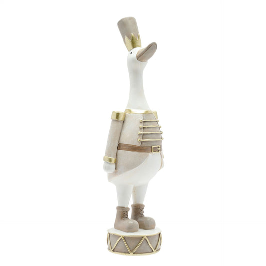 Decorative figurine of a goose in armor on a white background